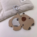 Close-up of cute capybara shaped flip-top pocket mirror with silver metal keychain - No.5 Standing Capybara Mirror