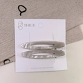 Elegant pair of pearlescent marble white acetate hair clips on a premium display card - Hollow Acetate Clip Set / Pearl White