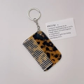 Chic acetate comb keychain featuring classic tortoiseshell patterns and a silver ring - Gold Chain / Leopard Print