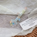 Floral acetate hair clip with iridescent marble texture and a sparkling blue rhinestone - Acetate Flower Clip / Blue Orange