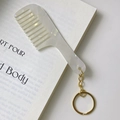 Elegant ivory marble acetate comb keychain with gold metal ring on open book - Gold Clasp / Mermaid Color