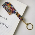Close-up of colorful acetate marble pattern comb keychain with a gold metal ring hook - Gold Clasp / Colorful
