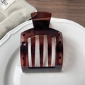 Flat square amber resin hair clip with elegant matte finish and hollow design for women - Glossy Reddish Brown