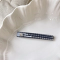 Macro view of blue plaid hair clip with heart rhinestone and lar mood text on ceramic - 7cm / Black Check
