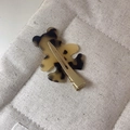 Detailed view of brown acetate bear hair clip with premium golden metal duckbill clamp - Light Leopard