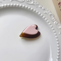 Detail view of heart hair clip with pink and tortoiseshell resin on white ceramic tray - Heart Chocolate Hair Clip