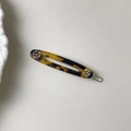 Ovaler hohl aus geschnittener Haarclip in Schildpatt-Optik mit Glitzersteinen - Leopardenprint