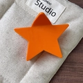 Vibrant orange star-shaped hair claw clip in a glossy finish for sweet hairstyles - Orange Hair Claw