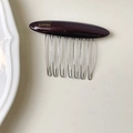 Handmade dark amber acetate hair comb with golden logo and eight silver metal teeth - Chocolate
