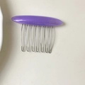Elegant purple acetate hair comb with 10 silver metal teeth and gold logo detail - Purple