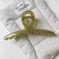 Olive green jelly square hair claw clip with gold spring on a beige canvas pouch - Crossing Type / Cross Green