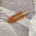Elegant amber acetate hair clip with golden metal base for women side styling - Orange