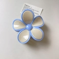 Light blue and cream color block flower hair claw clip with a glossy resin finish - Apricot With Blue Edge