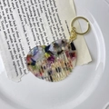 Close-up of colorful heart-shaped acetate comb with premium texture and gold keychain - 10# Mixed Pattern
