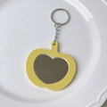 Yellow apple-shaped acrylic keychain with a heart-shaped mirror and silver ring - Gold Keychain / Yellow