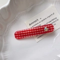 Rode geruite haarklem met een hartvormige diamant-strass op een wit dienblad - Rode Gingham Rechthoekige Clip
