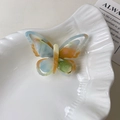Eleganter Schmetterlings-Haarclip aus buntem Acetat mit feiner Tinten-Gradient-Textur - Orangegrün