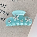 Pinza per capelli in acetato azzurro con strass e ciondoli floreali a fiocco - Blu