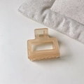 Minimalist rectangular hair claw clip in translucent amber orange with metal spring - Small Square