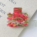 Pinza per capelli in acetato marmorizzato rosa e beige con design traforato lucido - Rosso