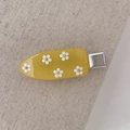 Cute bright yellow hair clip with five white 3D floral accents and metal duckbill base - Yellow