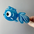 Süße blaue Haarklammer aus Acetat in Fischform mit großen Augen und Wellenstruktur - Blau