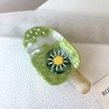 Detail view of the kiwi ice cream shape hair claw with green acetate texture - Kiwi Style (3#)