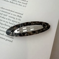 Detail of acetate hollow oval hair clip with classic tortoiseshell pattern and metal clip - Brown Coffee