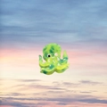 Pince à cheveux pieuvre en acétate vert et bleu avec fond de ciel au coucher du soleil - Poulpe Vert