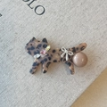 Leopard print acetate cat hair clip with rhinestone collar and bow detail charm - Tortoiseshell Cat Style