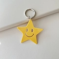 Cute yellow star keychain with a smiling face and silver metal ring for bags - Solid Yellow