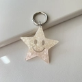 Pink and white gradient star keychain with glitter details and a smiley face - Glitter Beige