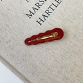 Dark red wavy acetate hair clip with gold metal base and Creation France lettering - Red / Approx. 6.1cm