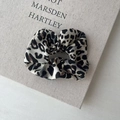 Chic leopard print scrunchie in black and white chiffon for stylish hair styling - Light Leopard Style