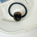 Elegant vintage hair tie featuring a dark blue marble-textured rose ornament with black band - Blue Brown