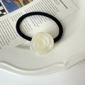 Elegant black elastic hair tie featuring a creamy white acetate rose flower ornament - Mermaid White