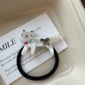 Detalle del coletero de gato en resina de mármol blanco con collar de strass rosa y lazo café - 2# Goma Blanca