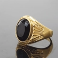 Vintage gold men's ring featuring a large faceted black onyx gemstone and engraved band - Size 7 / Gold Base Faceted Black Stone