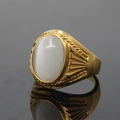 Golden titanium steel ring with oval white cat eye stone and engraved texture - Size 7 / Gold Setting White Cat's Eye