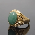 Vintage gold-toned men's signet ring featuring a polished green oval gemstone and textured sides - Size 7 / Gold Tone Aventurine Style