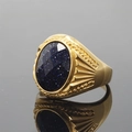 Men's gold-plated titanium ring featuring an oval blue sandstone with a starry effect - Size 7 / Gold Plated Blue Sandstone (Faceted)