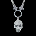 Silver skull pendant necklace with pavé rhinestones and detailed ram head clasps - White Zirconia Black Eye Skull Pendant With Woven Chain