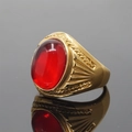 Men's vintage gold ring featuring a polished oval red gemstone and carved details - Size 7 / Gold Setting Red Glass Stone