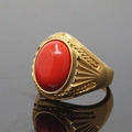 Golden titanium steel ring featuring a large red oval gemstone with carved texture - Size 7 / Gold Tone Red Turquoise Style
