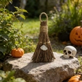 Detail of natural wood witch broom ornament with cord loop on a rustic stone surface - White Crystal / 10cm