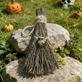 Detail of a handmade witch broom featuring natural wood branches and golden ore pendant - Tiger's Eye / 10cm