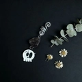 Detail of dark crystal dreadlock accessory with silver spiral and gothic skull charm - Smoky Quartz With Ghost