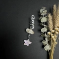 Detail view of handmade silver hair spiral with raw crystal and purple star pendant - Citrine With Star