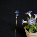Detail of blue crystal mushroom stake with hand-wrapped gold wire for plants - Blue Aventurine