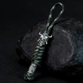 Handmade camo green paracord keychain with silver skull charm and Nordic rune bead - Camo Green